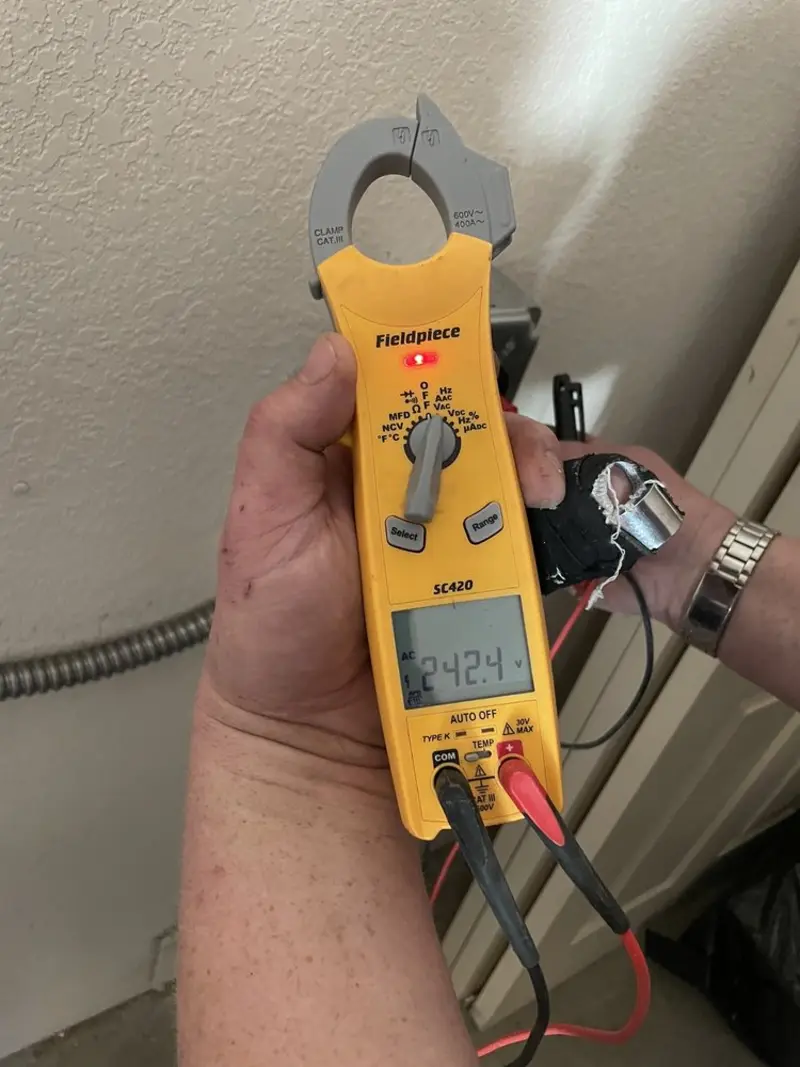 Voltage testing with clamp meter during Aluminum Wiring Replacement in Cimarron Hills